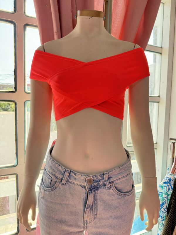 Top cruzado naranja neón